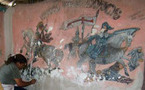 Remise en état d'une première murale au sanctuaire de Belony
