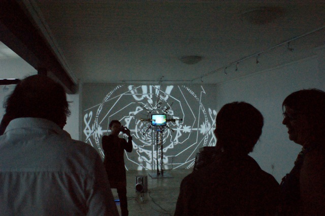 Gcamagwini : Metal, Ostrich Bones, TV, Videoprojection Gcamagwini : Metal, Ostrich Bones, TV, Videoprojection